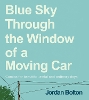 Blue Sky Through the Window of a Moving Car